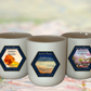 A visual representation of the Travel Collection Volume 1. The image showcases a collection of elegantly designed candles, hinting at the essence of different travel destinations through their labels and colors